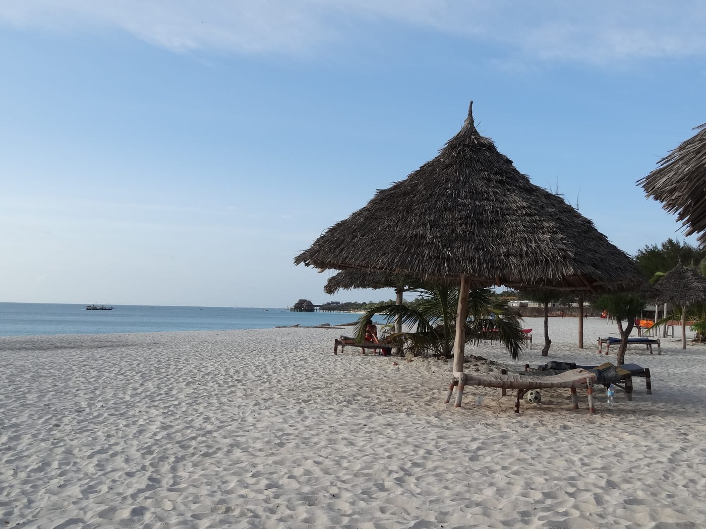 Beach hotel loungers on the white sand at Kendwa, northern Zanzibar