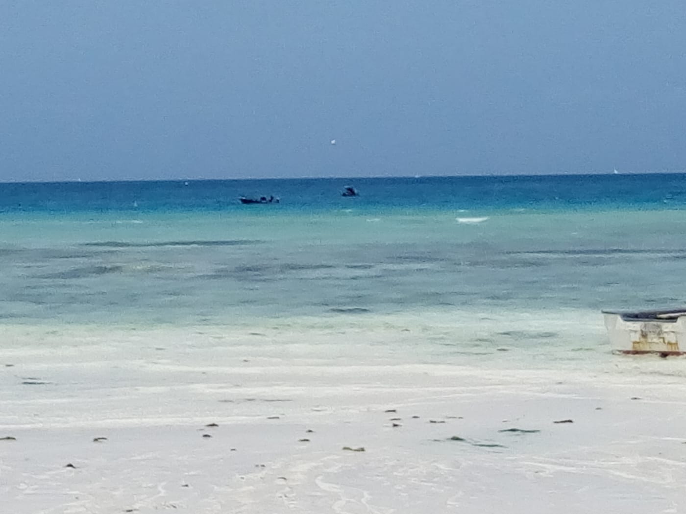 White sand and clear shallow water on the north coast of Zanzibar